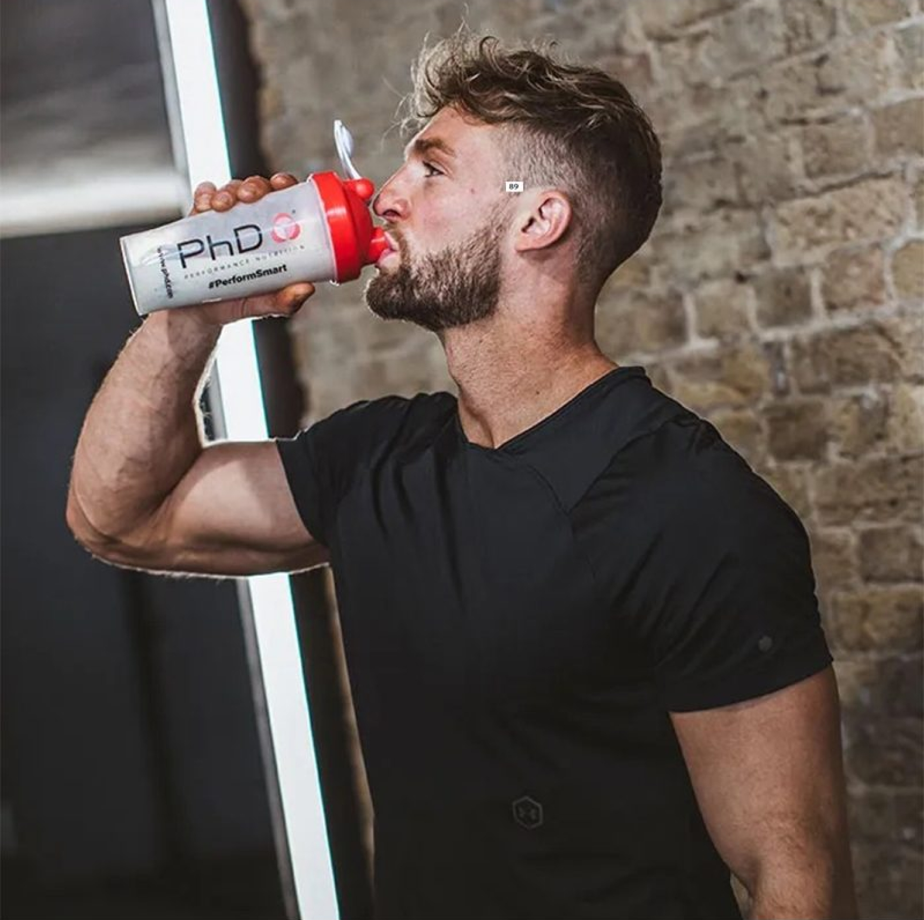 man drinking protien